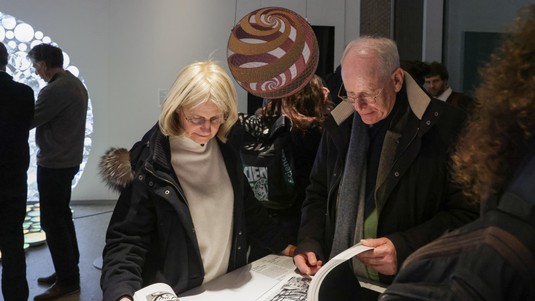 Visitors discovering the exhibition Shapes: Patterns in Art and Science - 2025 EPFL/Alain Herzog - CC-BY-SA 4.0