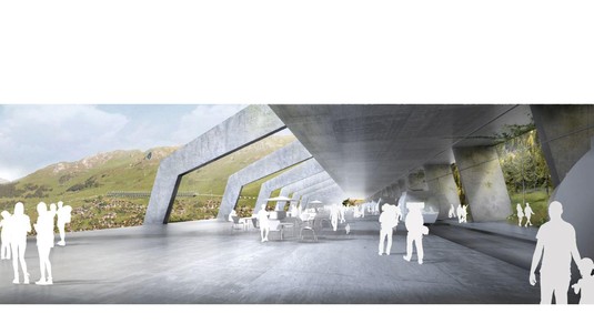 It is designed around a public space with views of the surrounding mountains. © Fiona Pià