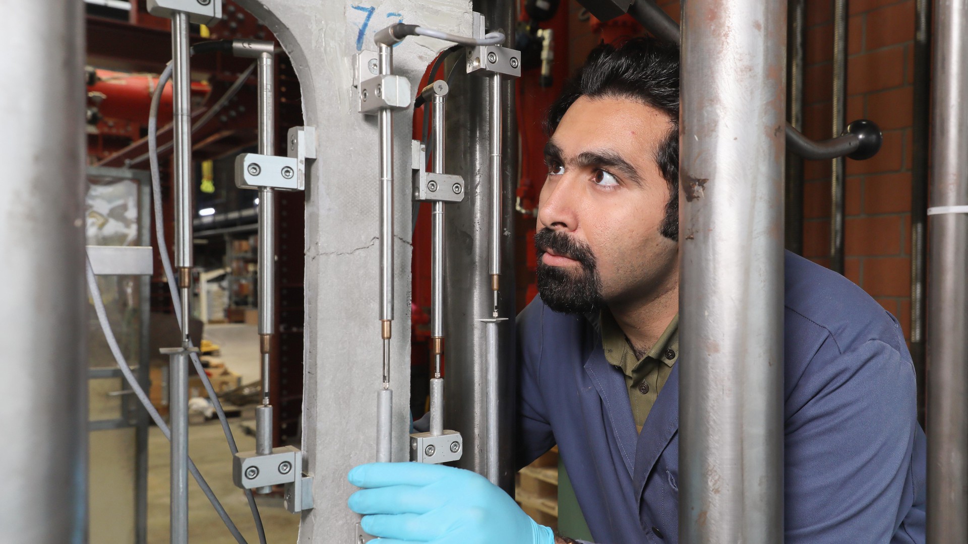 Amir Hajiesmaeili tested the properties of the new material. © Alain Herzog /EPFL