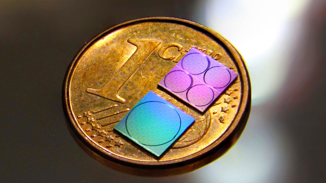 Photograph of the silicon nitride photonic chips used for frequency comb and photonic microwave generation. Credit: Junqiu Liu and Jijun He (EPFL).